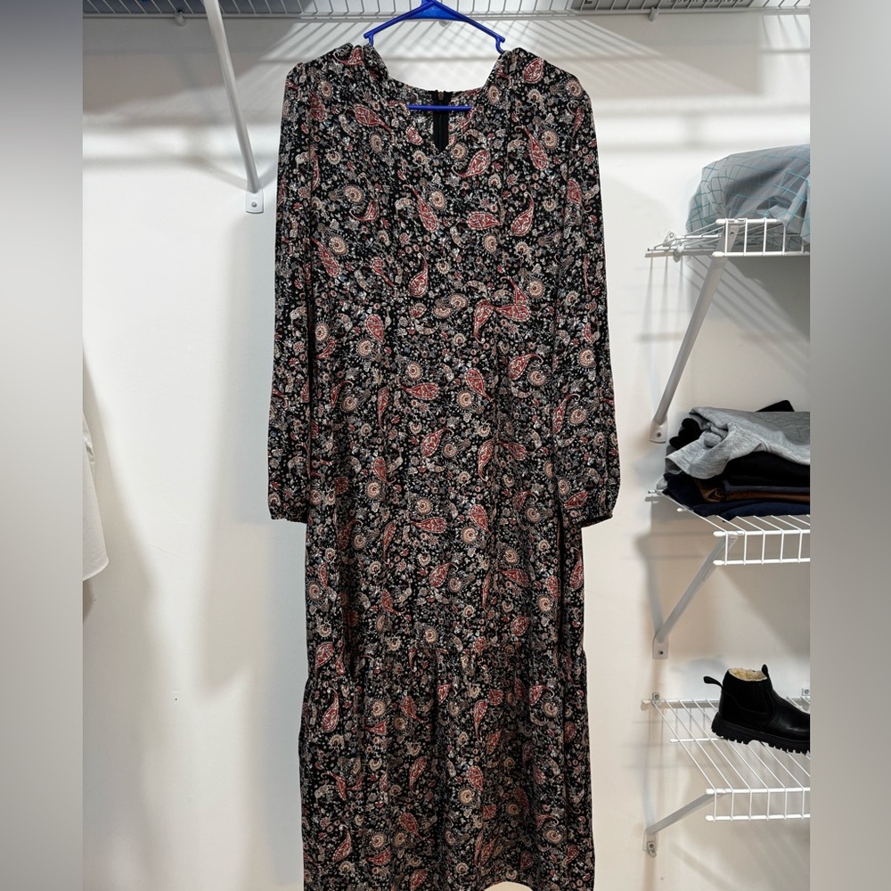 Bought this beautiful dress but it was too small for me,decided to cell it